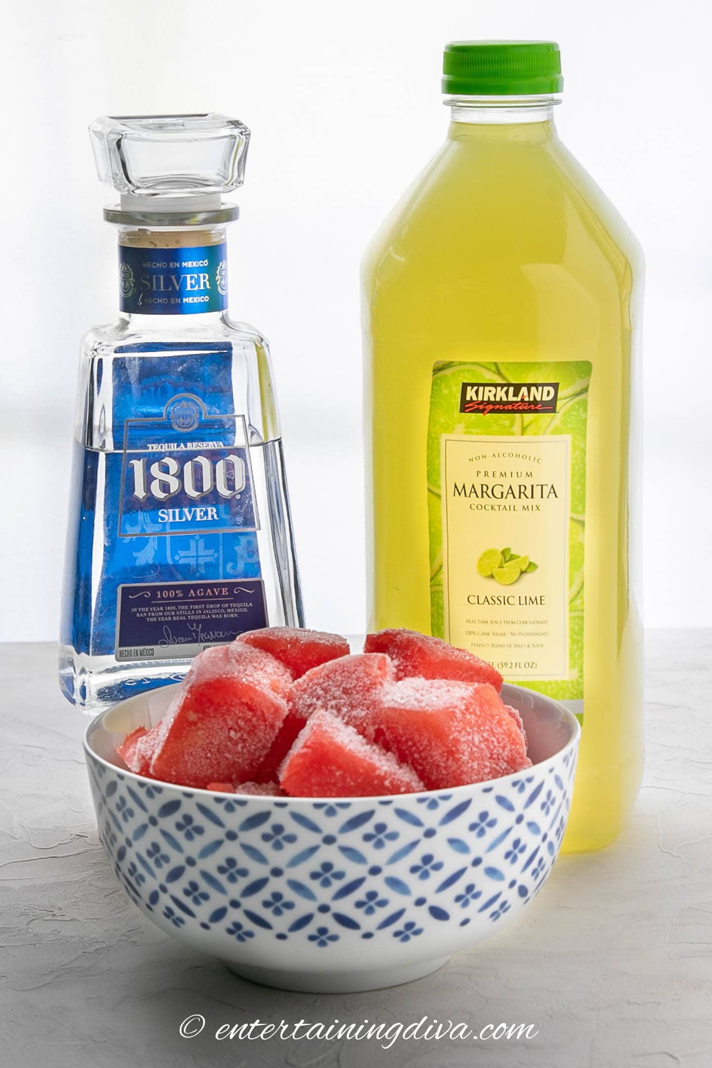 frozen watermelon margarita ingredients - tequila, lime margarita mix and fresh watermelon