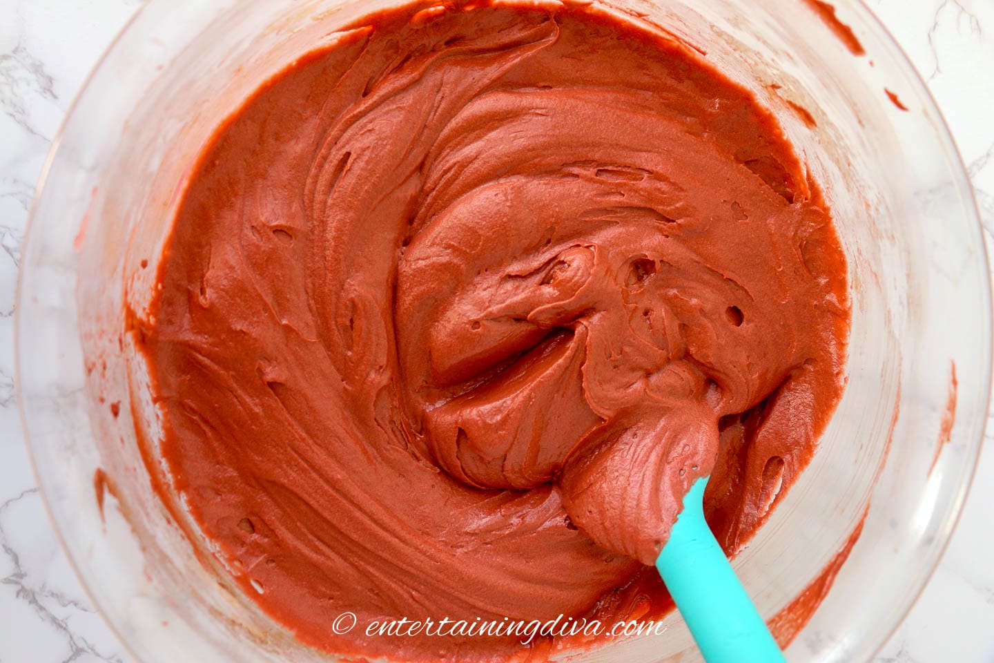 Red velvet cake batter in a bowl