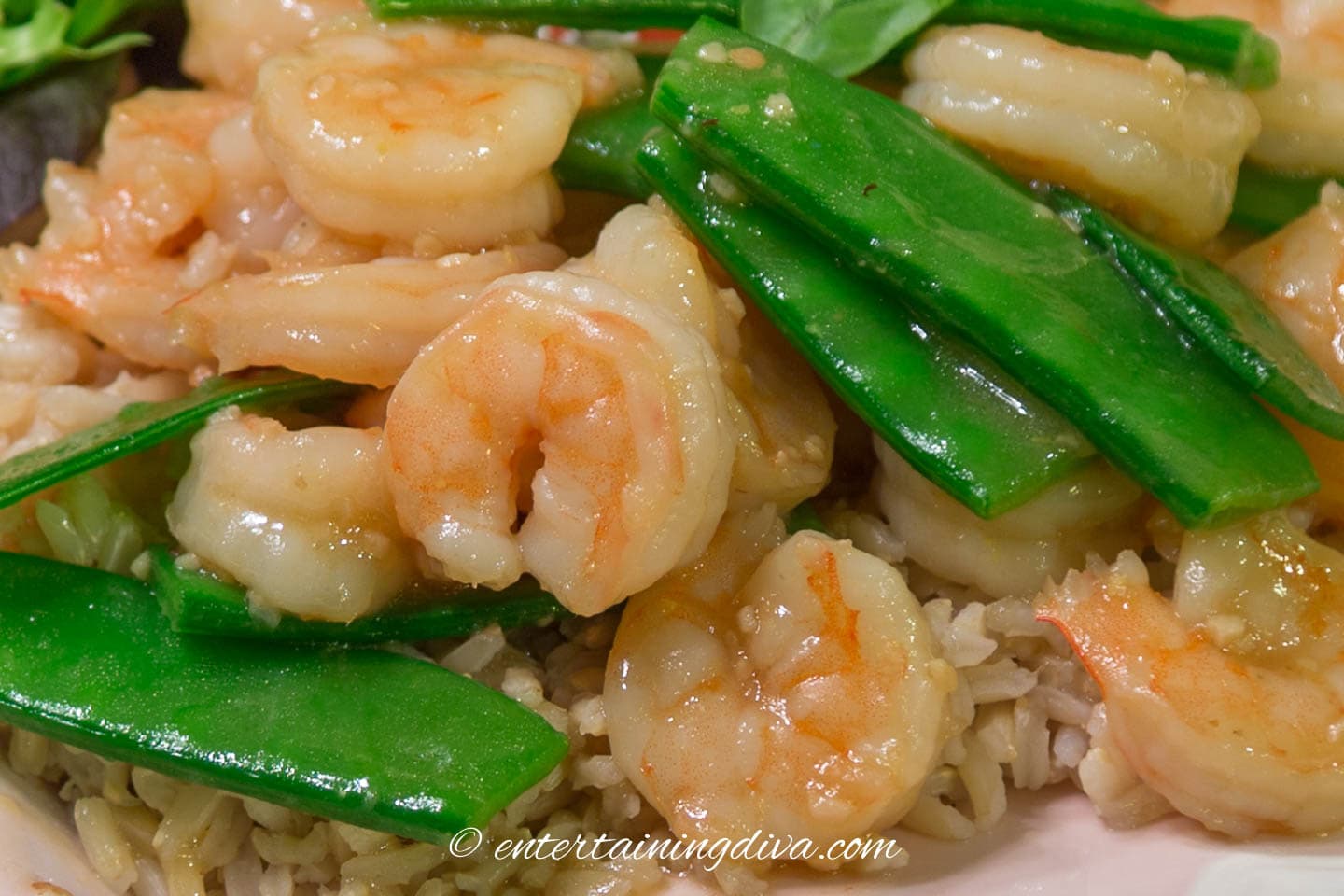close up of shrimp and snow pea stir fry
