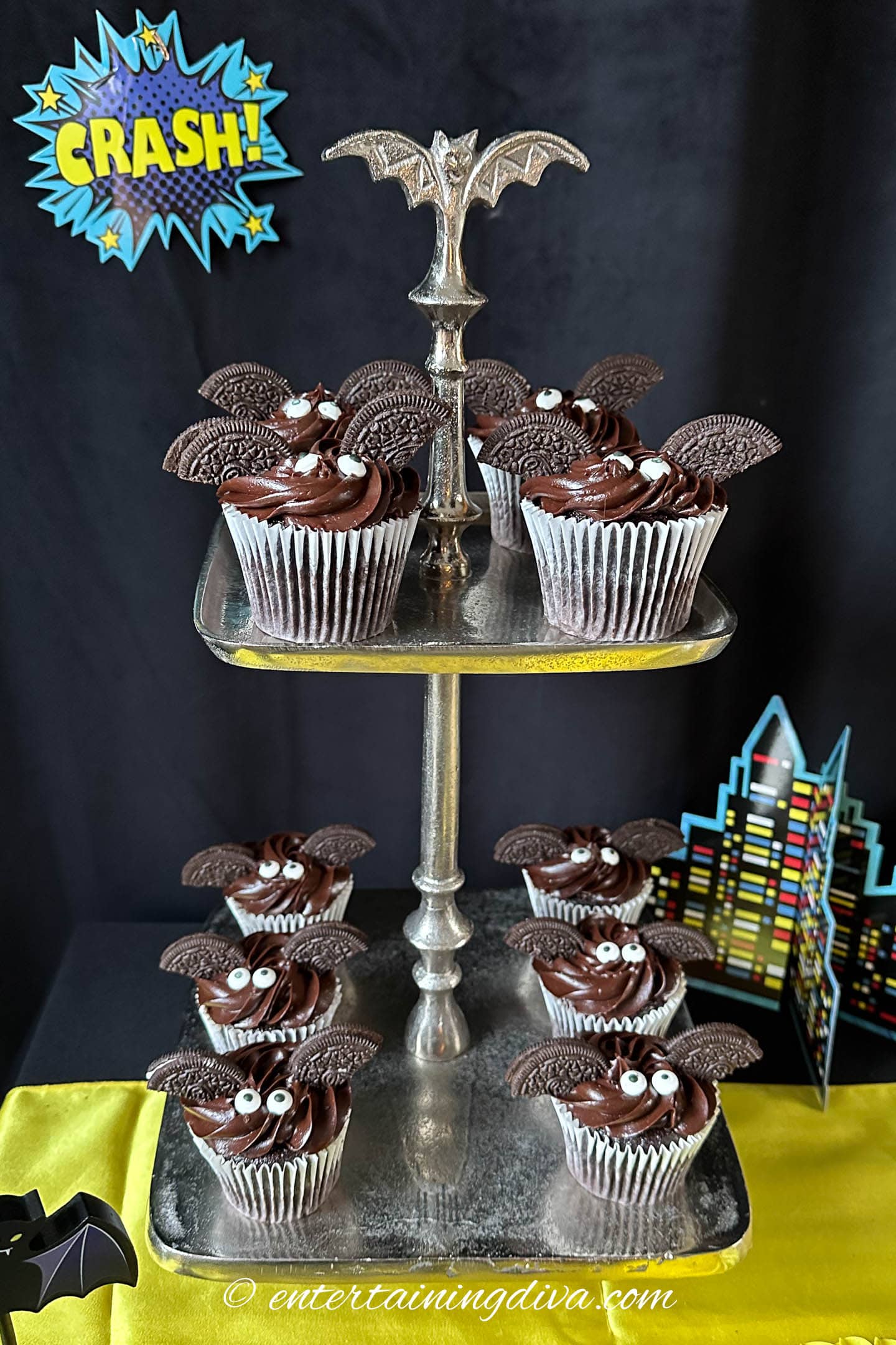 Bat cupcakes on a tiered cupcake stand