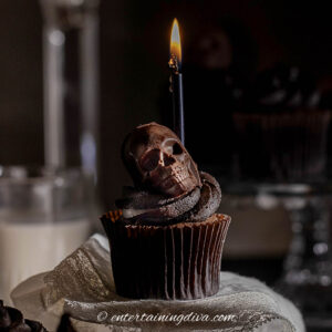 a skull Halloween cupcake with a candle