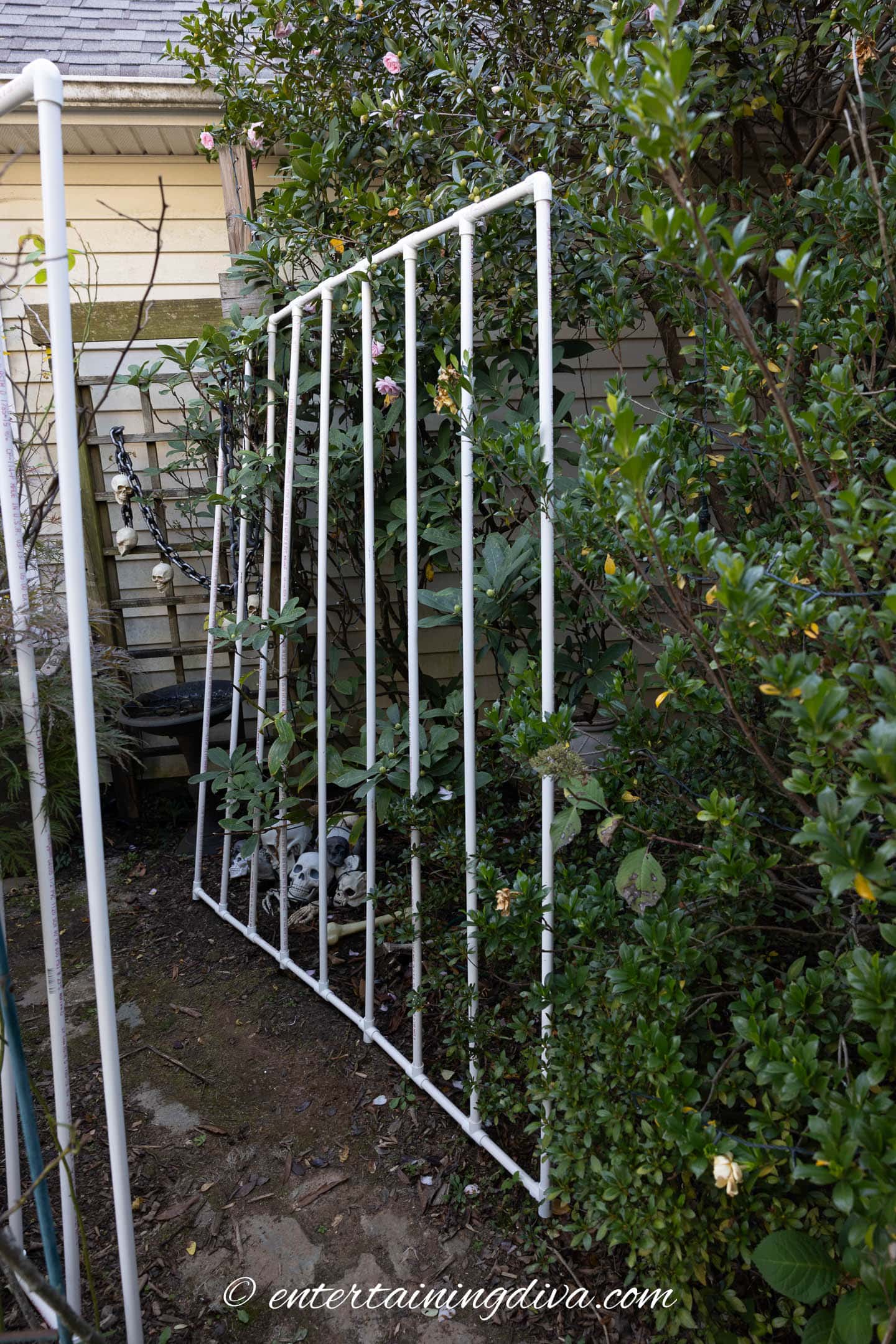 Arkham Asylum jail cell bars made from PVC pipe put up in the front yard