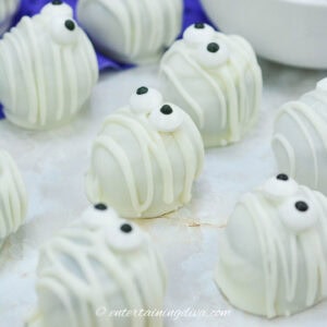 Close up of a few spooky mummy Oreo truffles