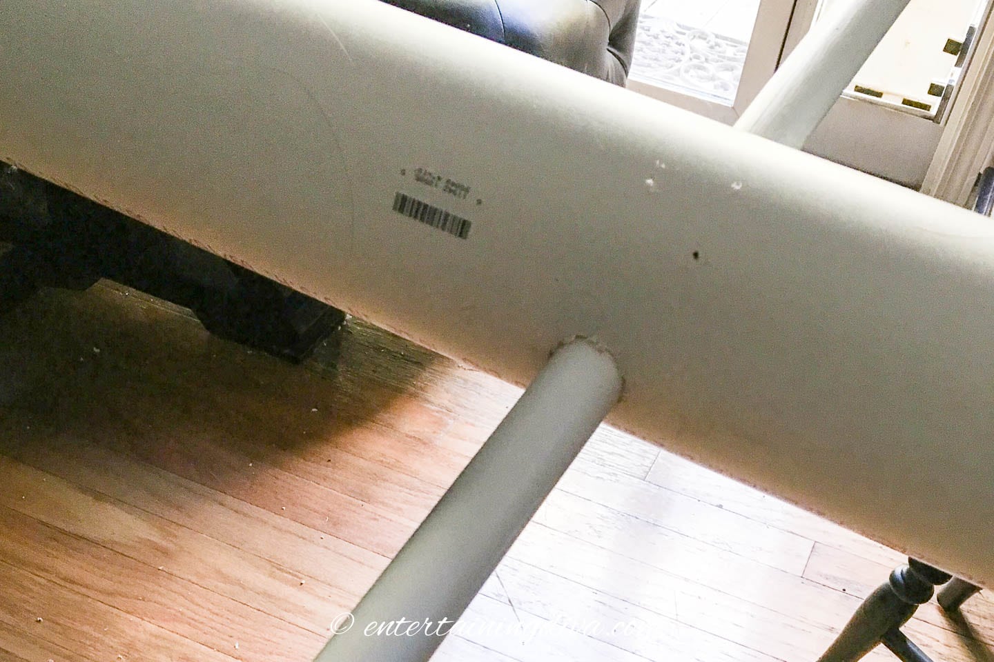 A small PVC pipe going through a large PVC pipe