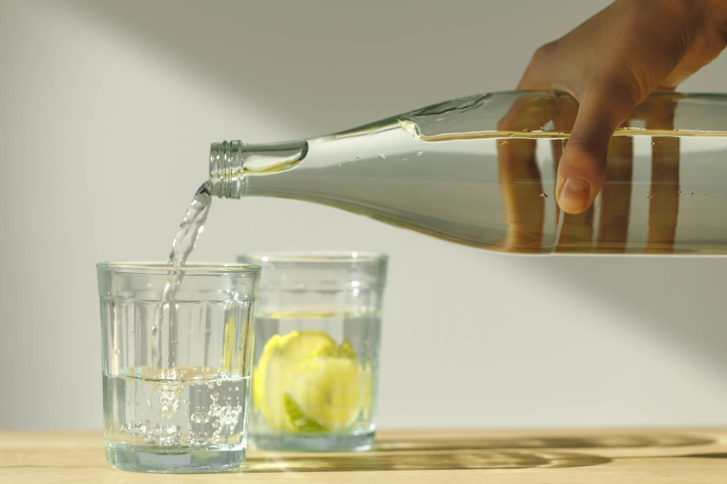 water being poured into glasses