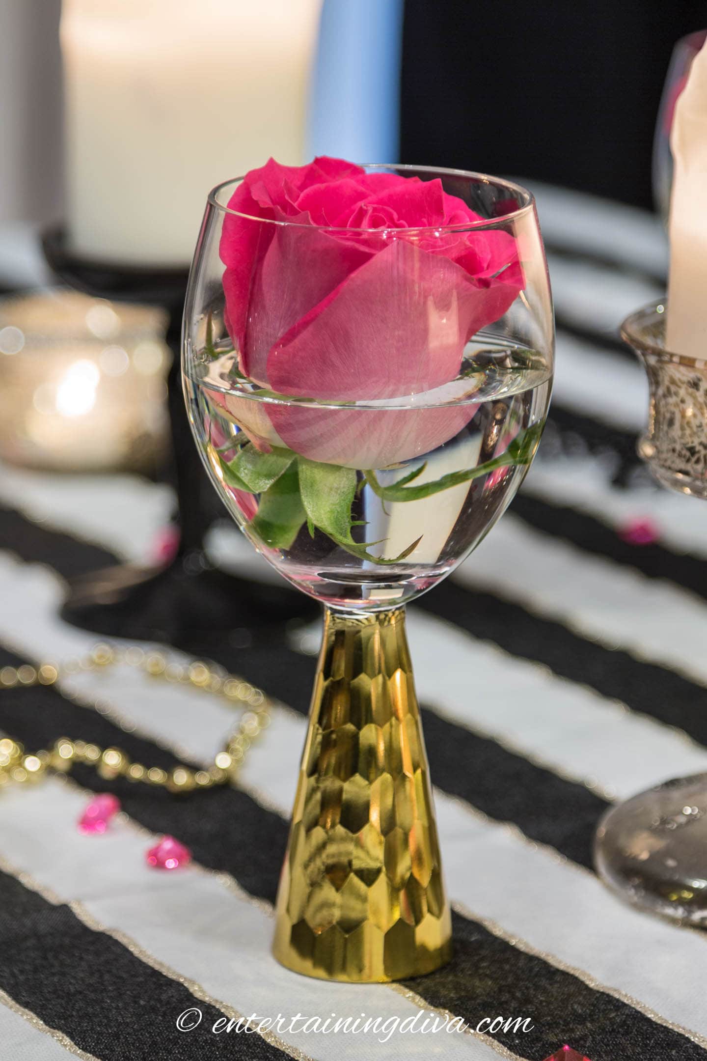 Pink rose in a wine glass
