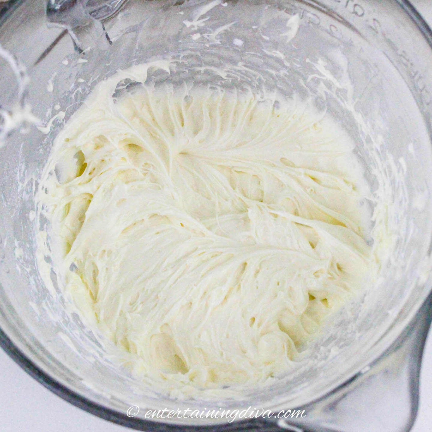 Cream cheese frosting in a mixing bowl