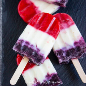 A stack of red white and blue popsicles