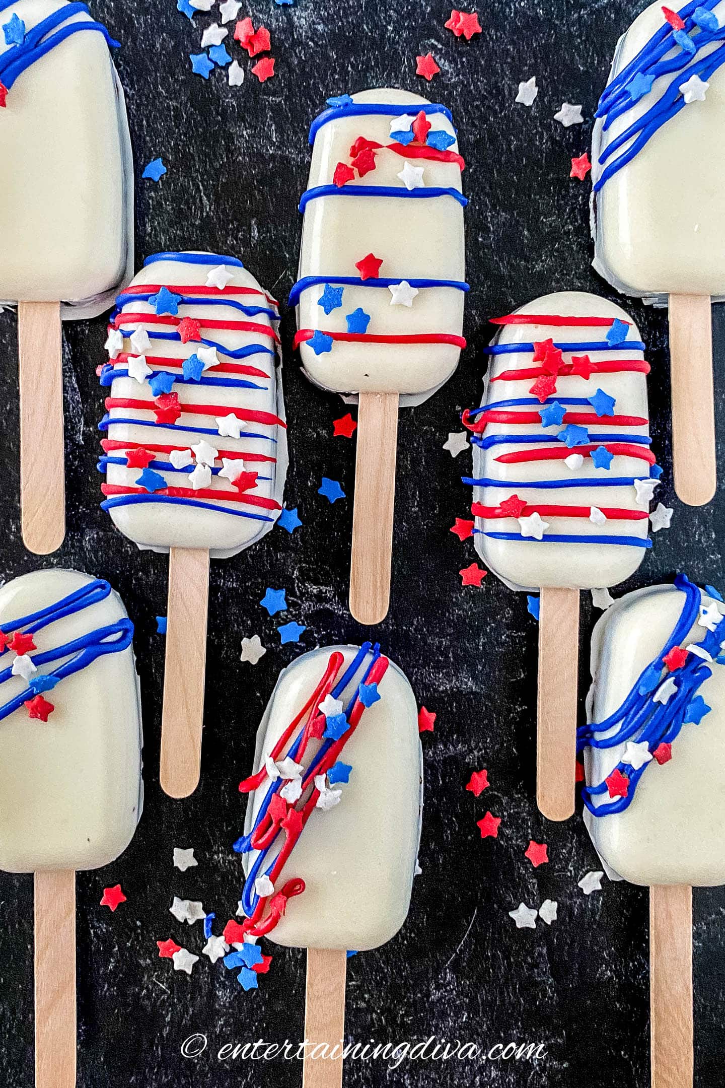 cakesicles decorated with red, white and blue sprinkles