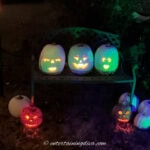 Halloween singing pumpkins on a bench