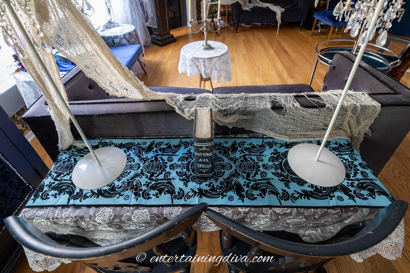 A table with the Disney haunted mansion runner on it