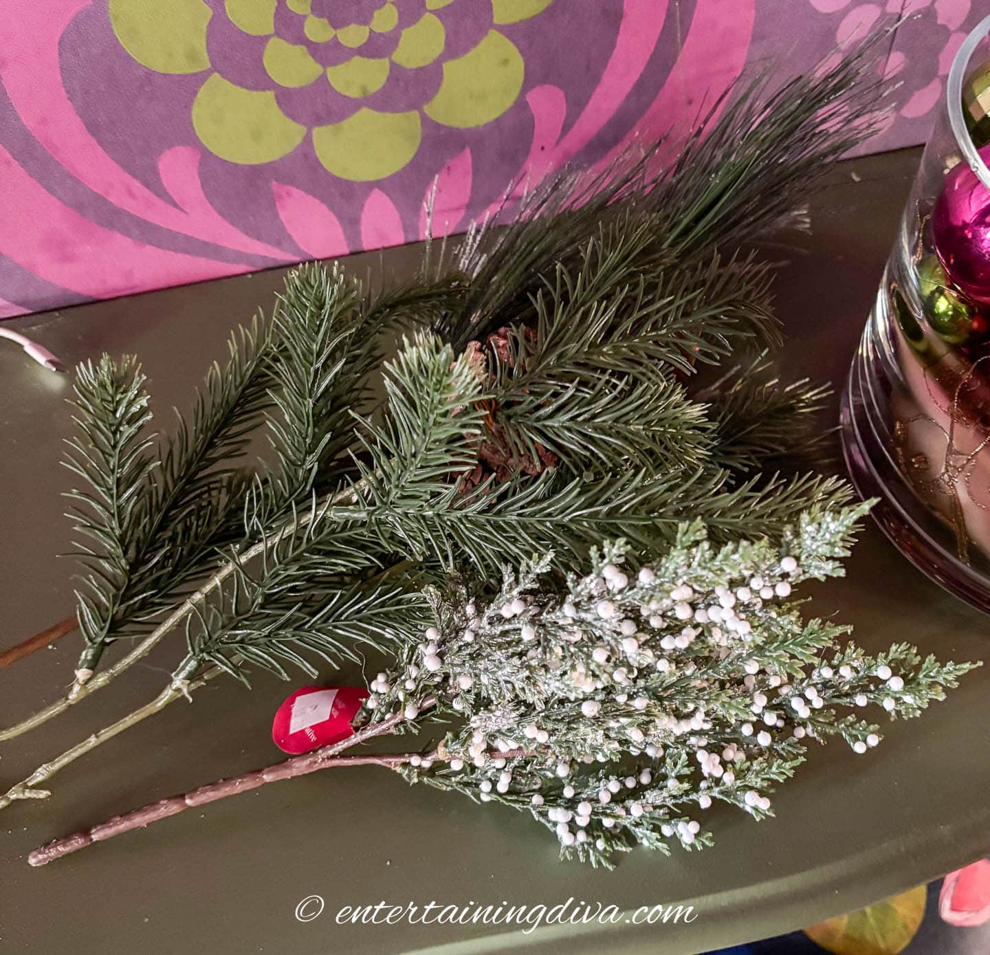 Artificial evergreen picks on a table