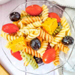 An overhead view of rotini pasta salad with Italian dressing