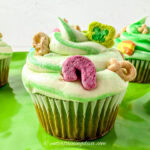 Close up of a lucky charms cupcake with marshmallow buttercream frosting
