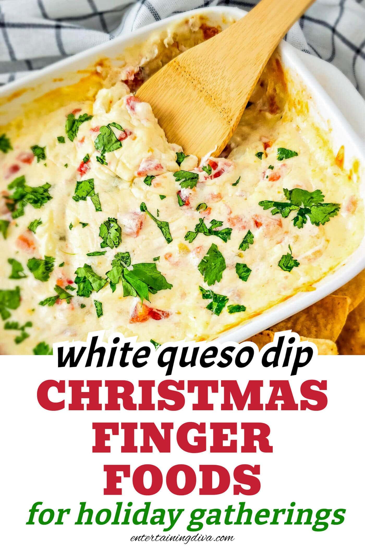 Close up of white queso dip in a baking dish with a wooden spoon