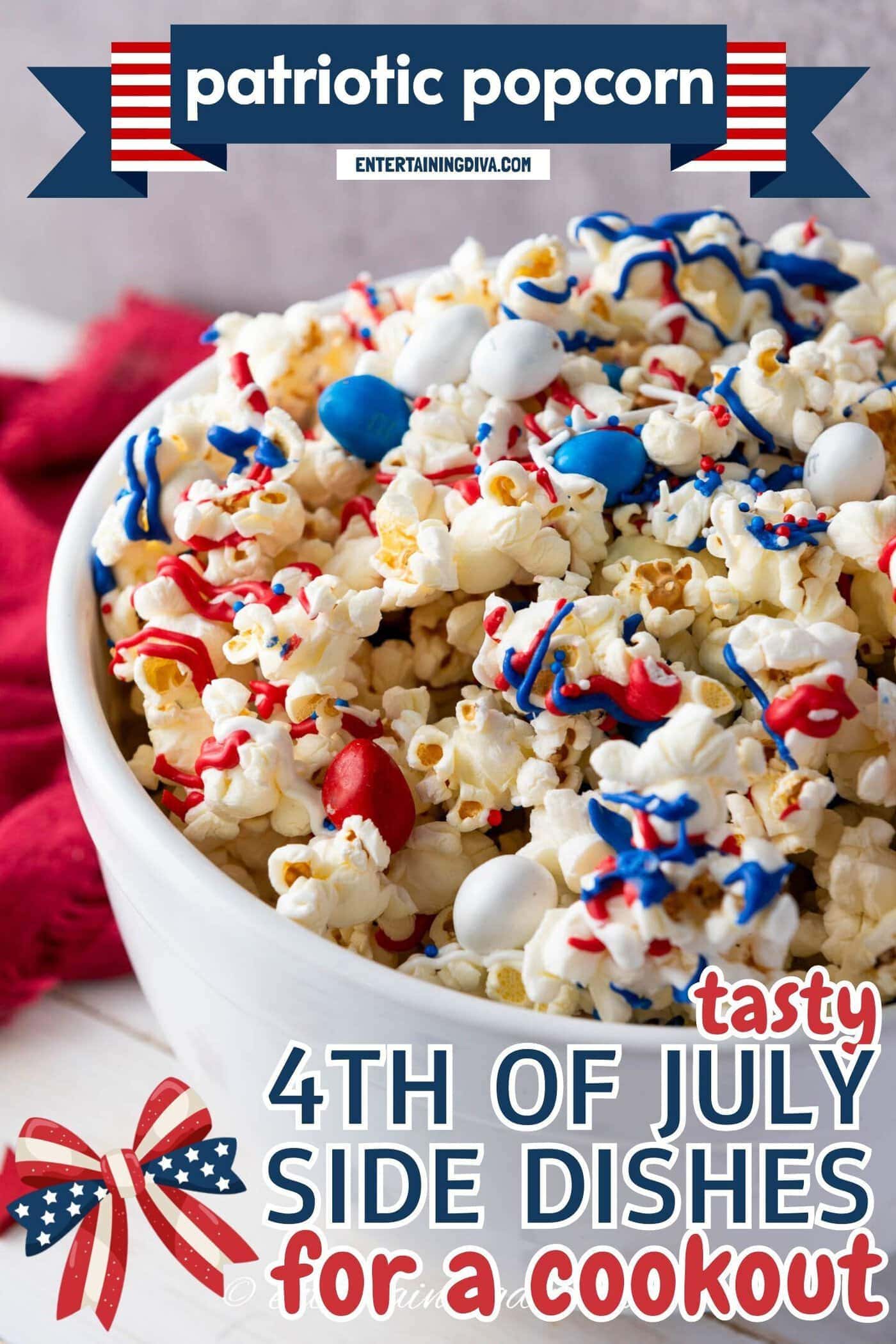 A white bowl filled with popcorn, red, white, and blue candy-coated chocolates, and matching colored drizzle.