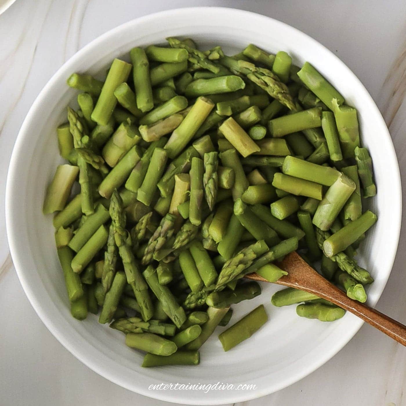 A bowl with blanched asparagus