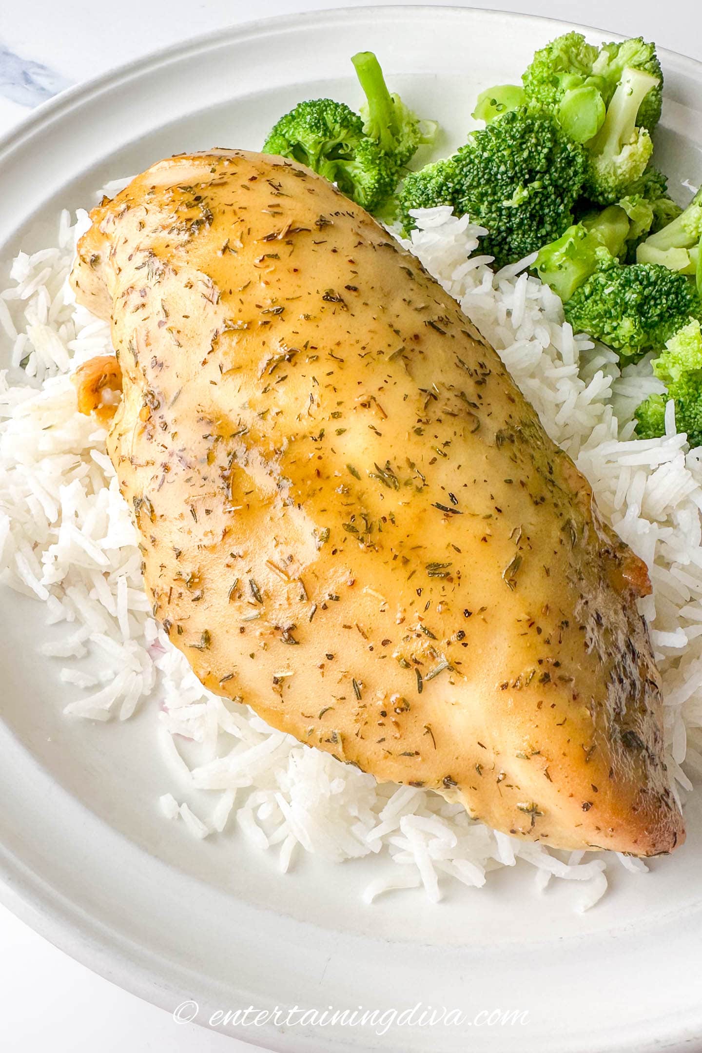 overhead of baked chicken breasts with honey mustard sauce