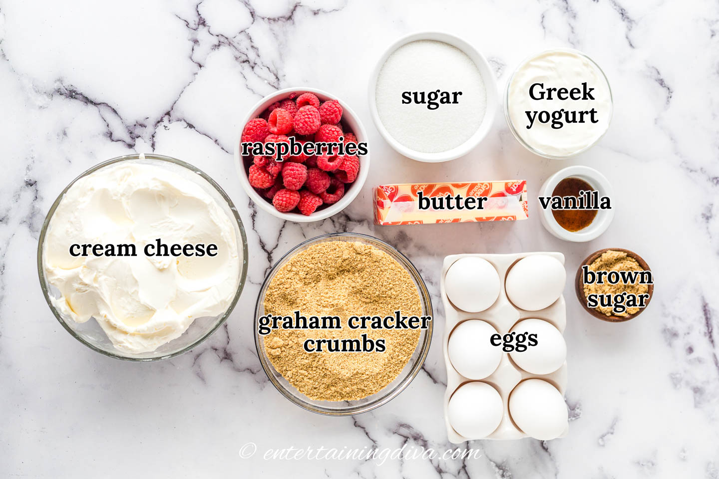 baked raspberry cheesecake ingredients - cream cheese, raspberries, sugar, Greek yogurt, butter, vanilla, graham cracker crumbs, eggs, brown sugar