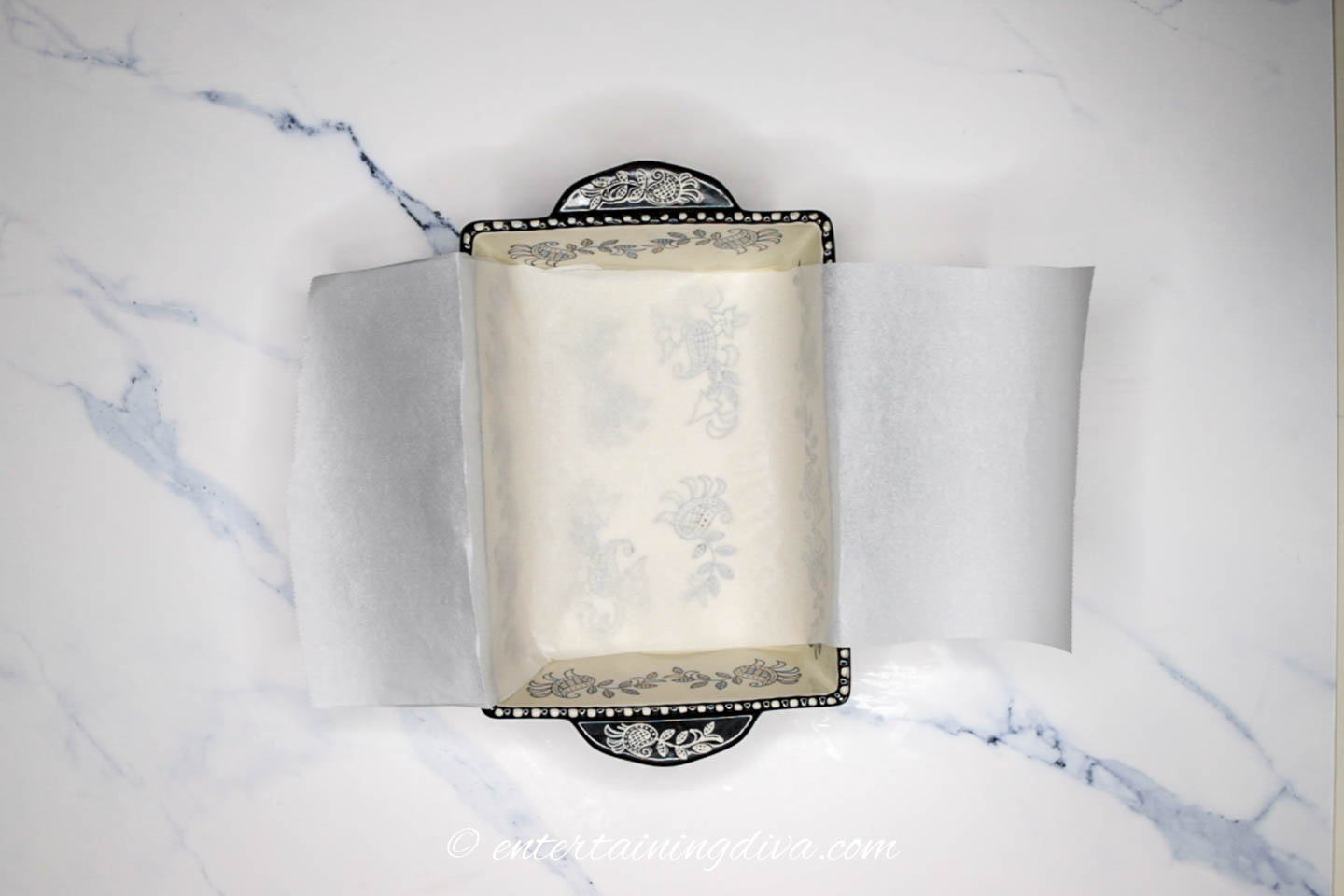 A piece of parchment paper cut to fit a loaf pan
