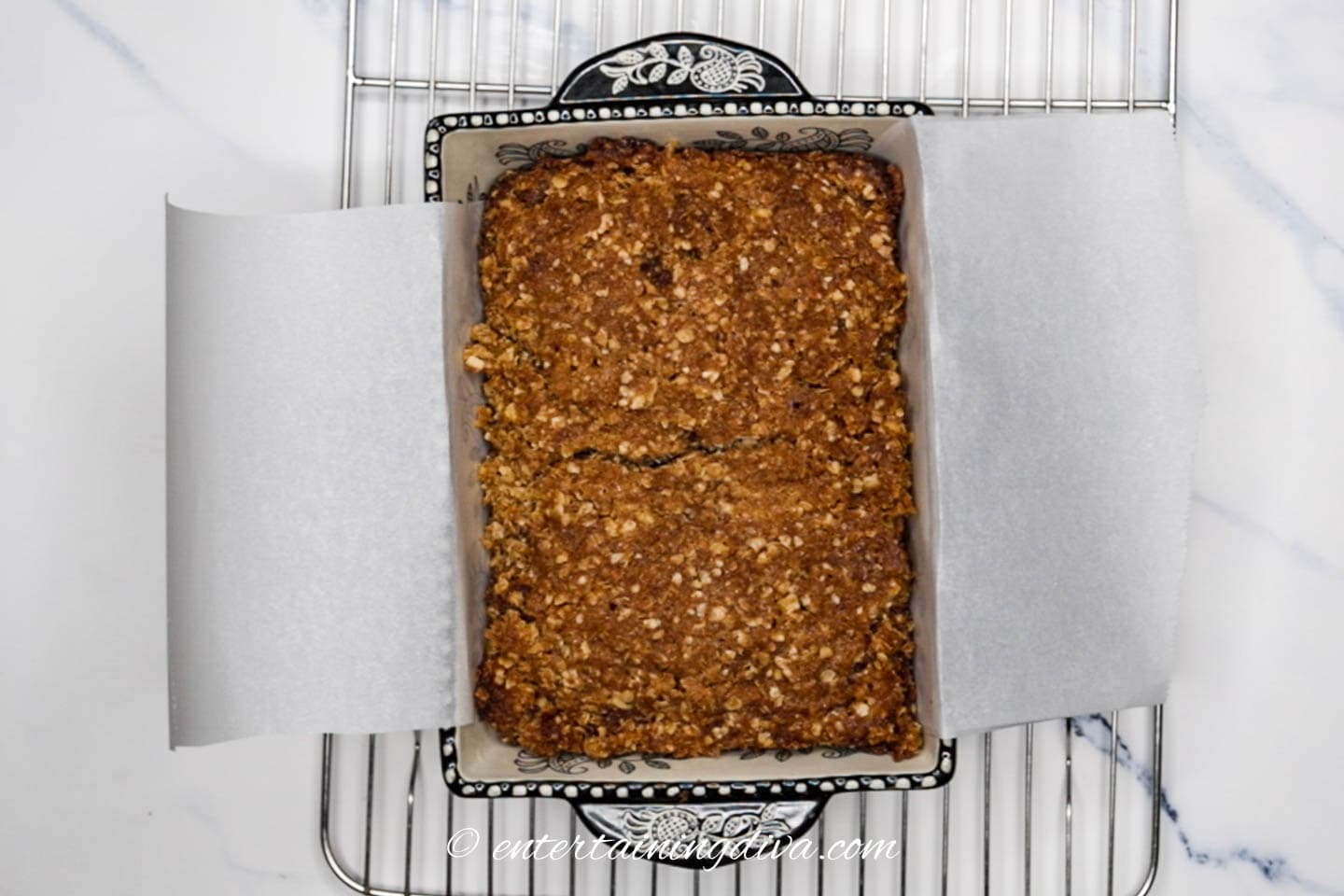 banana nut bread in pan with parchment paper
