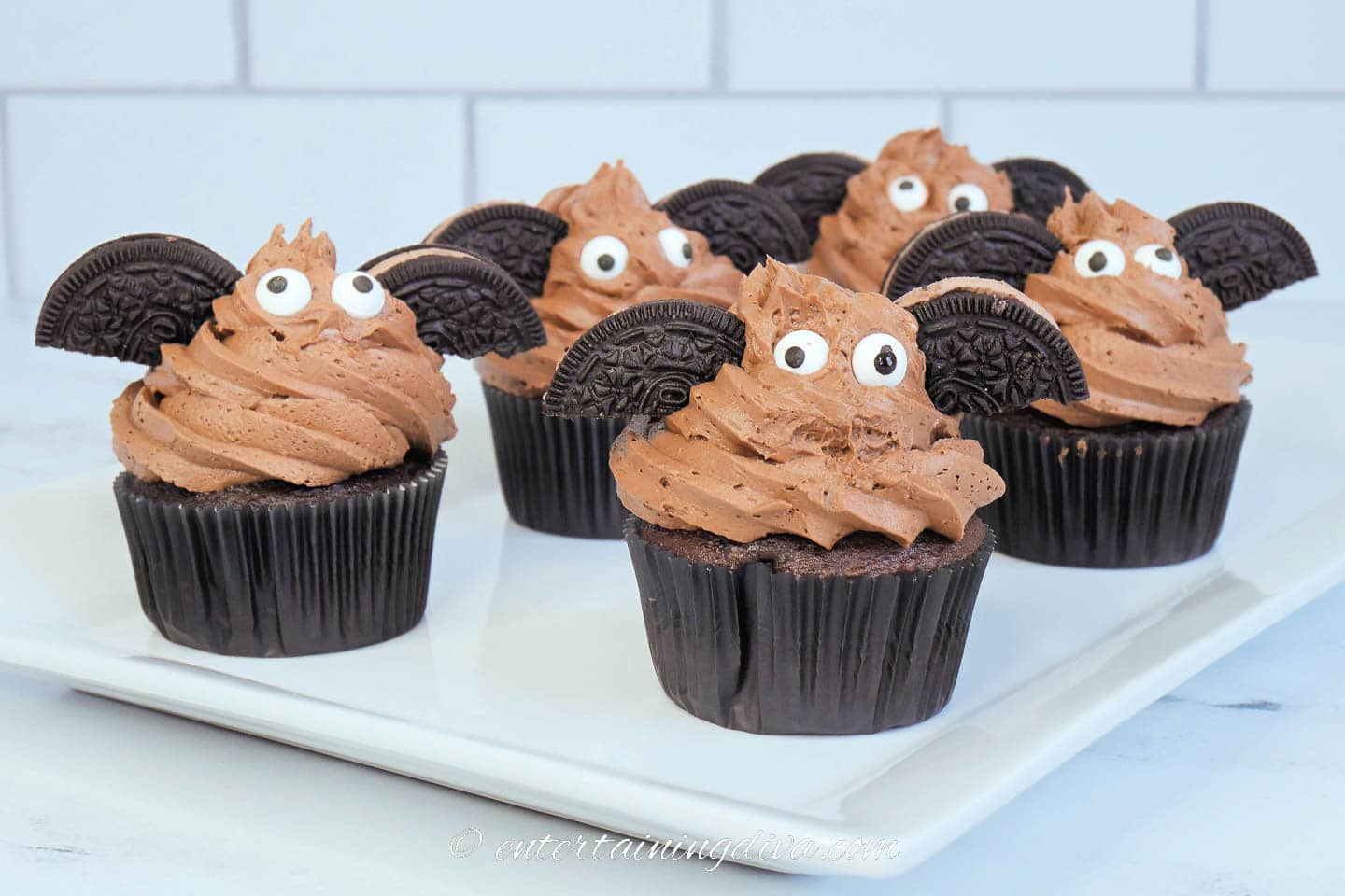 Bat Halloween cupcakes on a plate