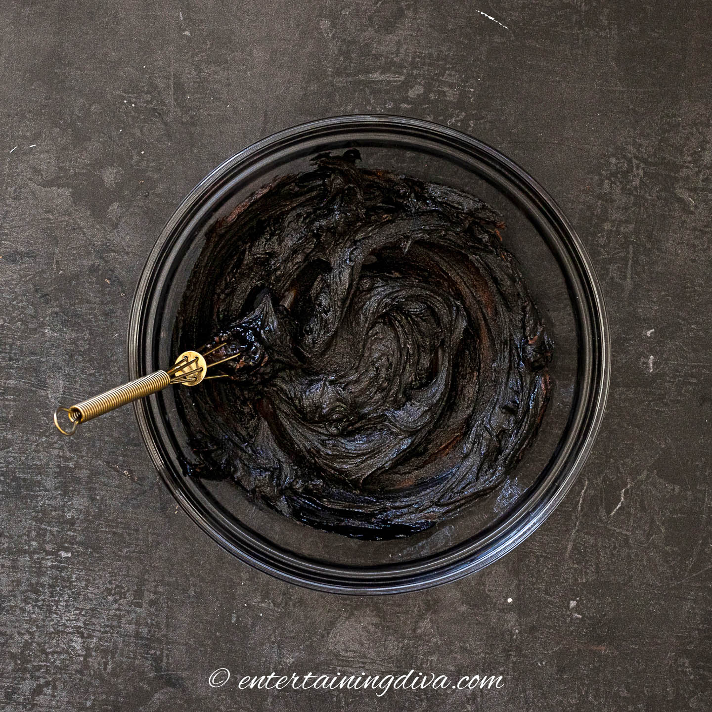 black chocolate buttercream frosting in a bowl