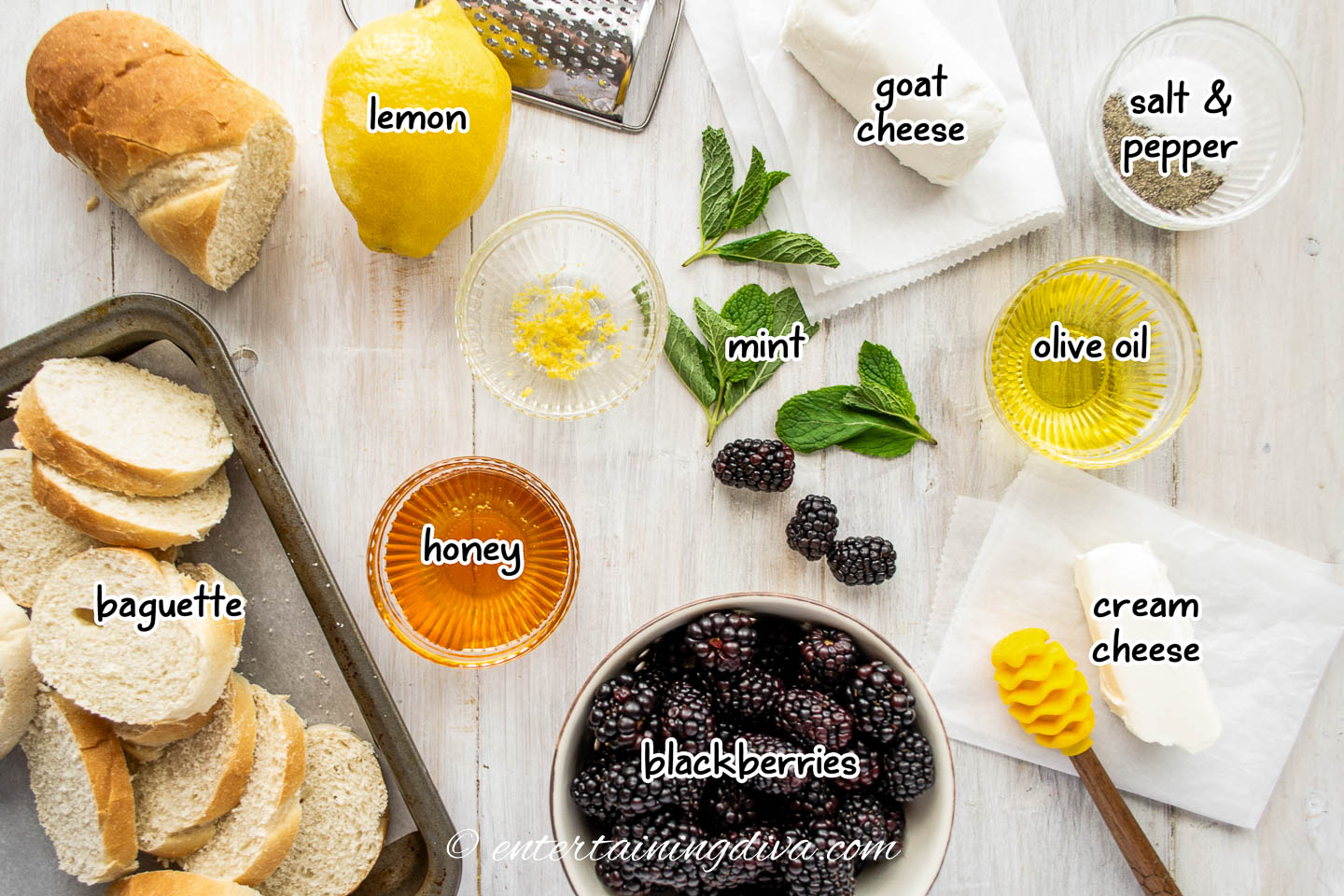 blackberry crostini ingredients - baguette, lemon, honey, blackberries, goat cheese, mint olive oil, cream cheese, salt and pepper