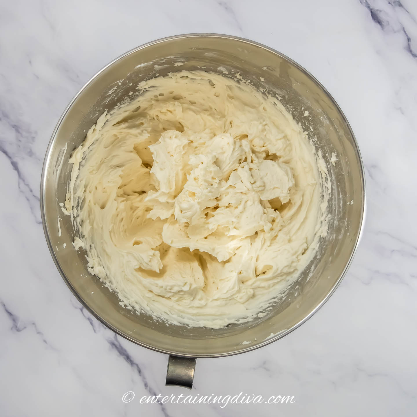 white vanilla frosting in a bowl