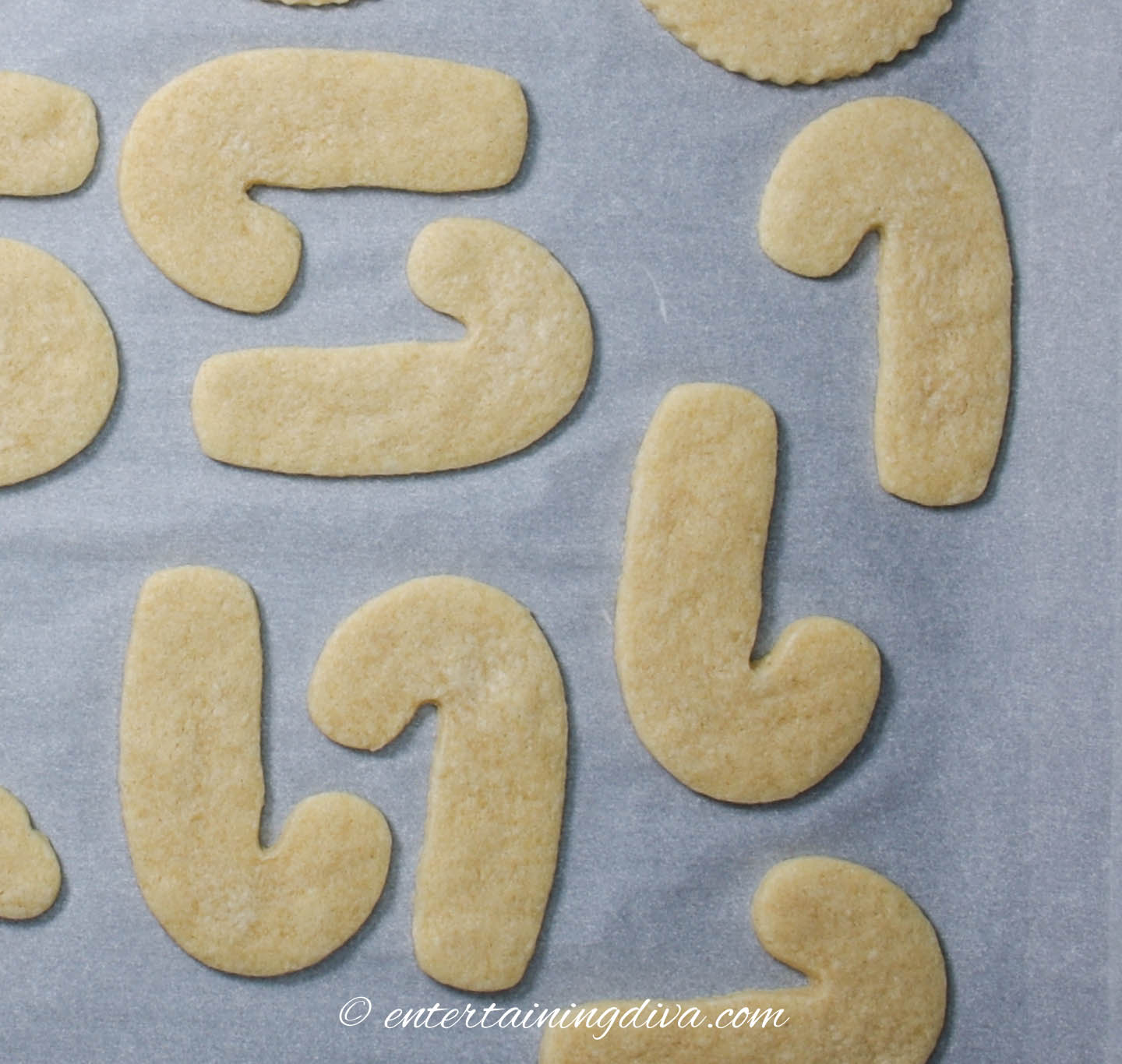 candy cane sugar cookies on a cookie sheet