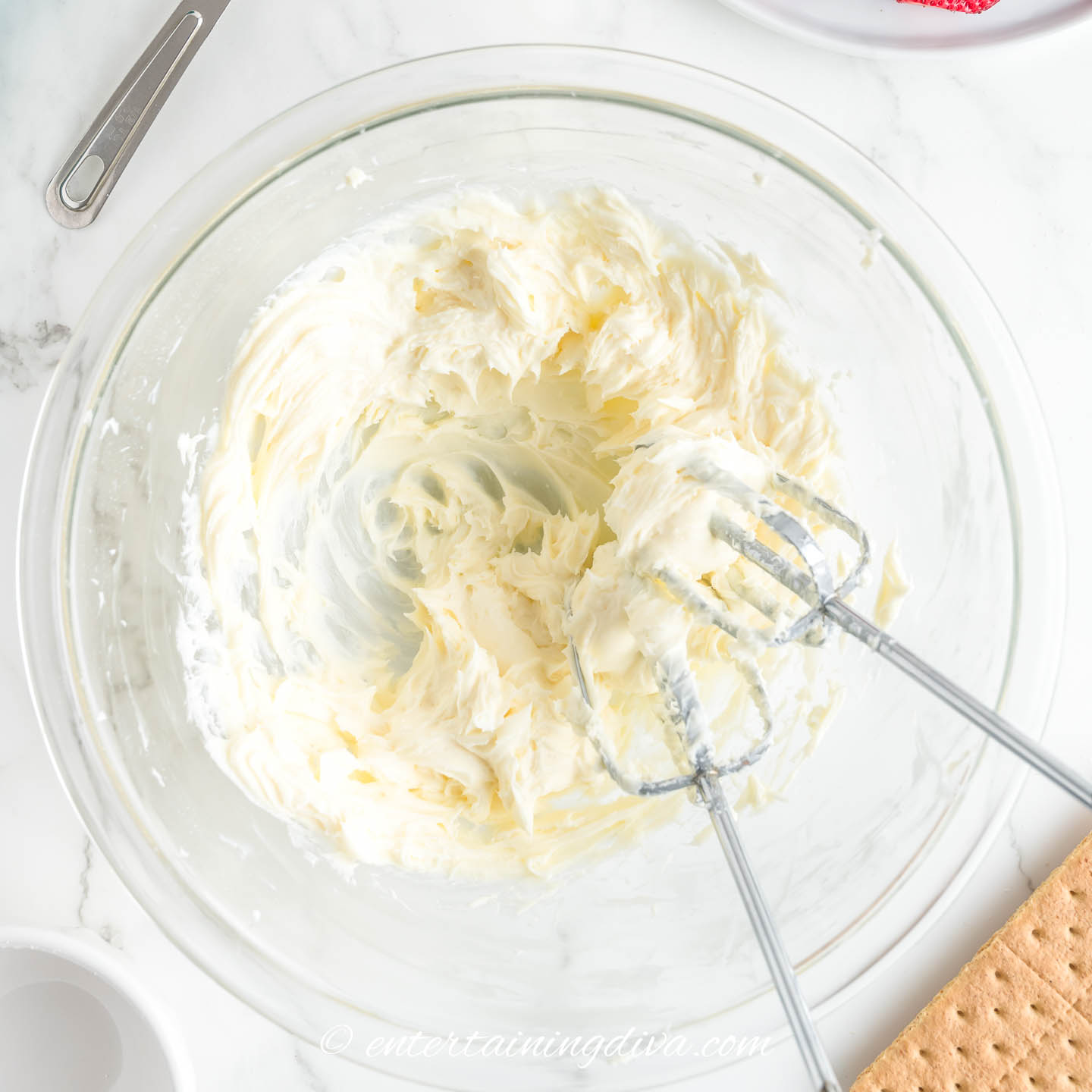 cheesecake mixture in a mixing bowl