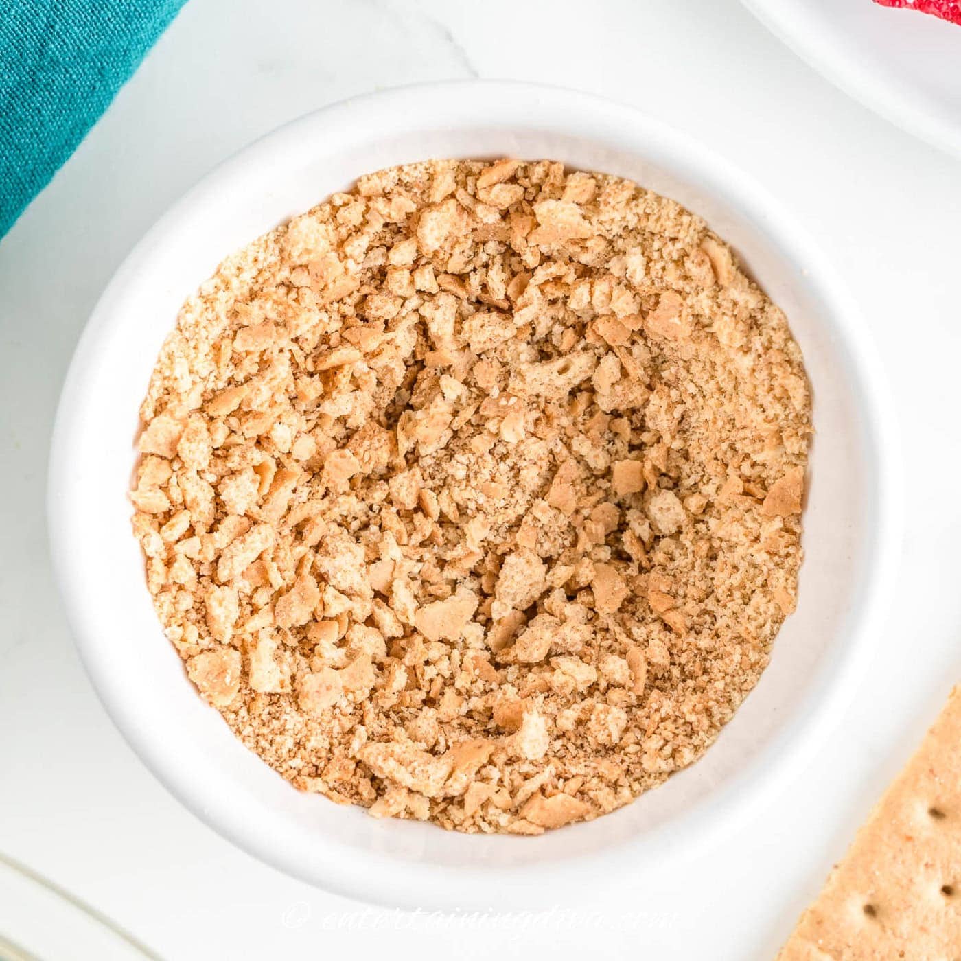 graham cracker crust mixture in a bowl