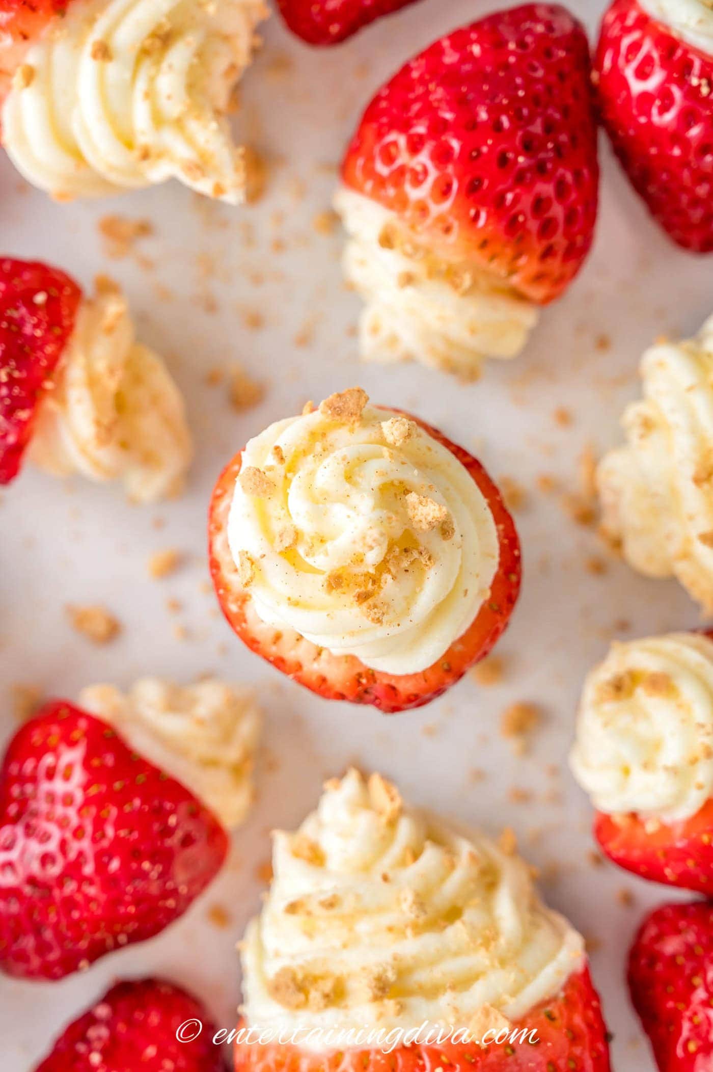 overhead picture of cheesecake stuffed strawberries