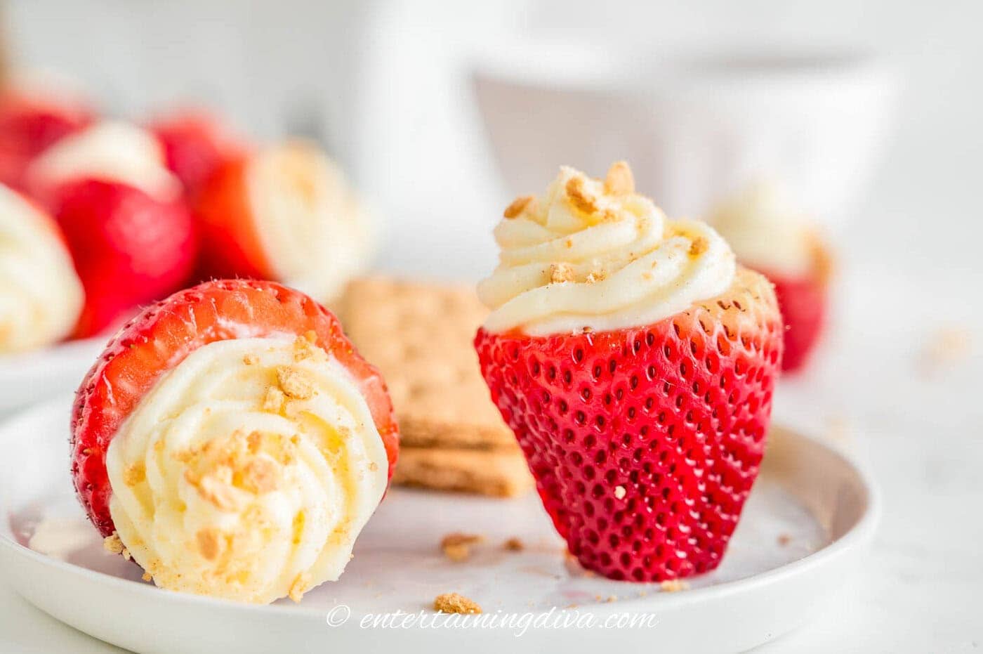 strawberries filled with cream cheese and topped graham cracker crust