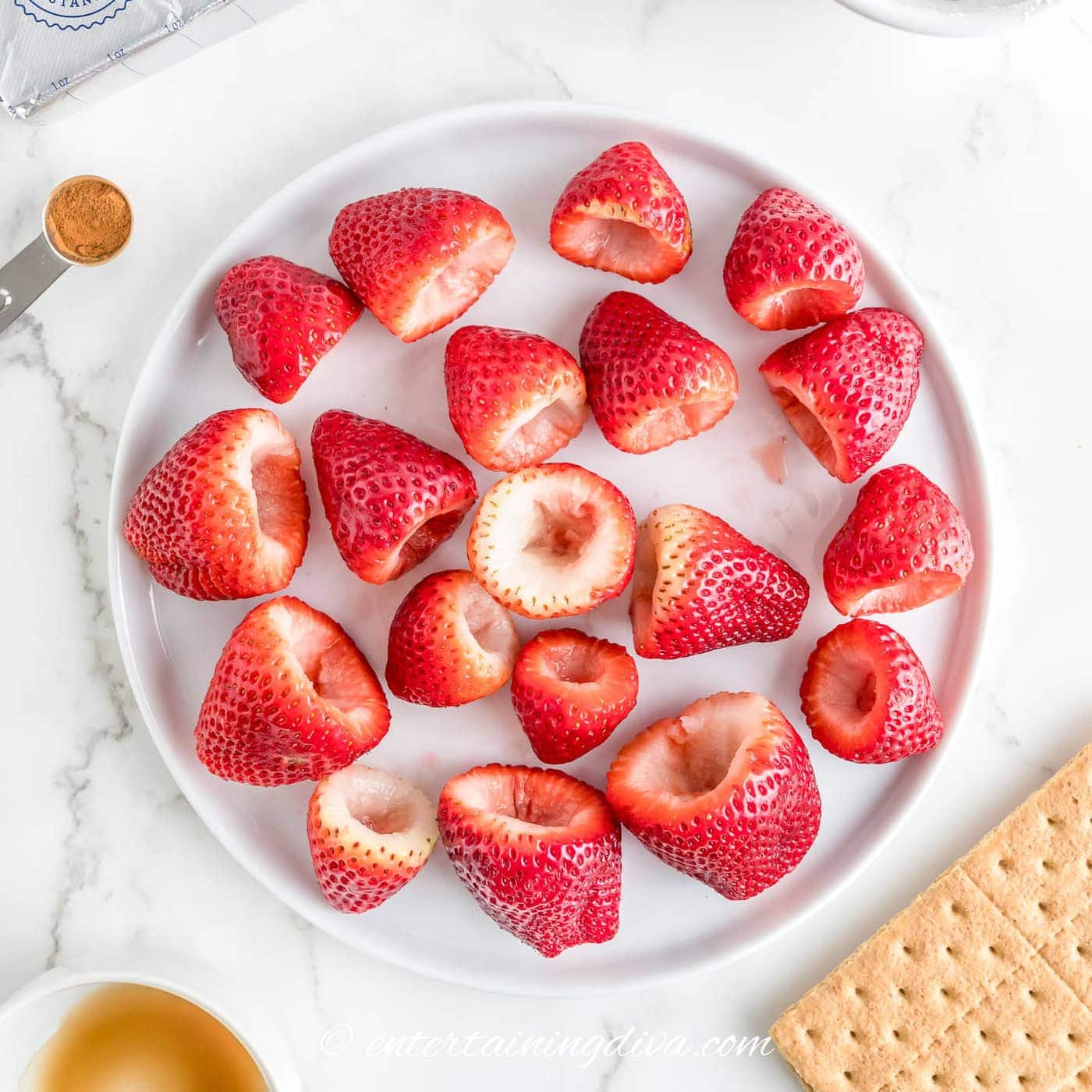 strawberries with holes cut in the top