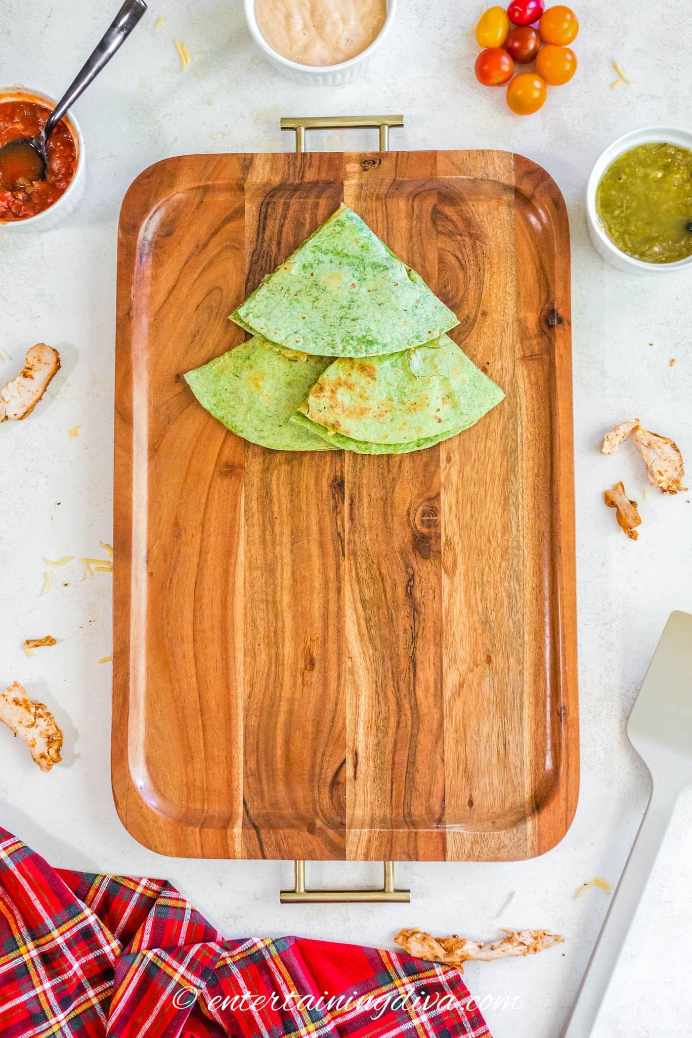 Two layers of quesadillas forming the top of a Christmas tree shape