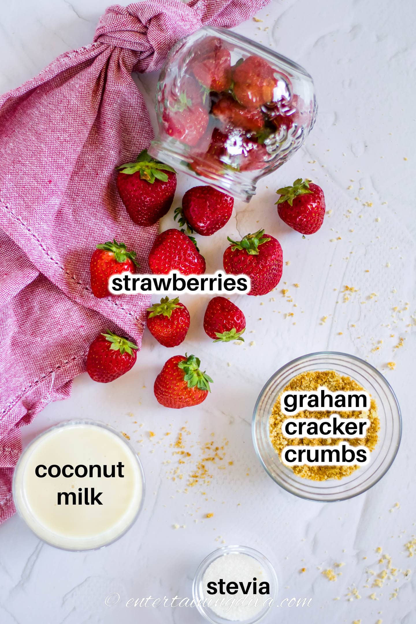 coconut milk and strawberry popsicle ingredients - strawberries, coconut milk, stevia and graham cracker crumbles