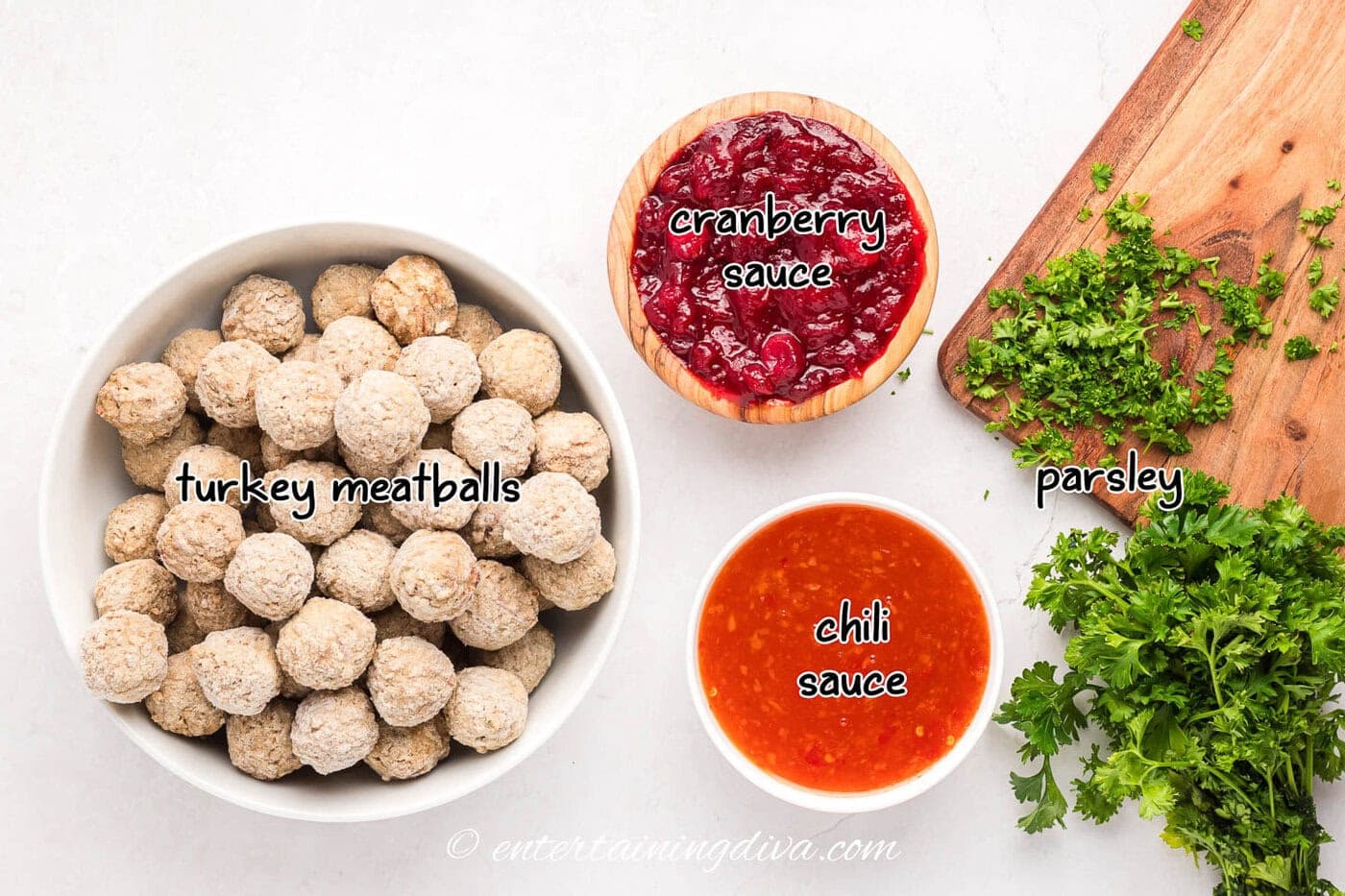cranberry meatballs ingredients - turkey meatballs, cranberry sauce, chili sauce and parsley