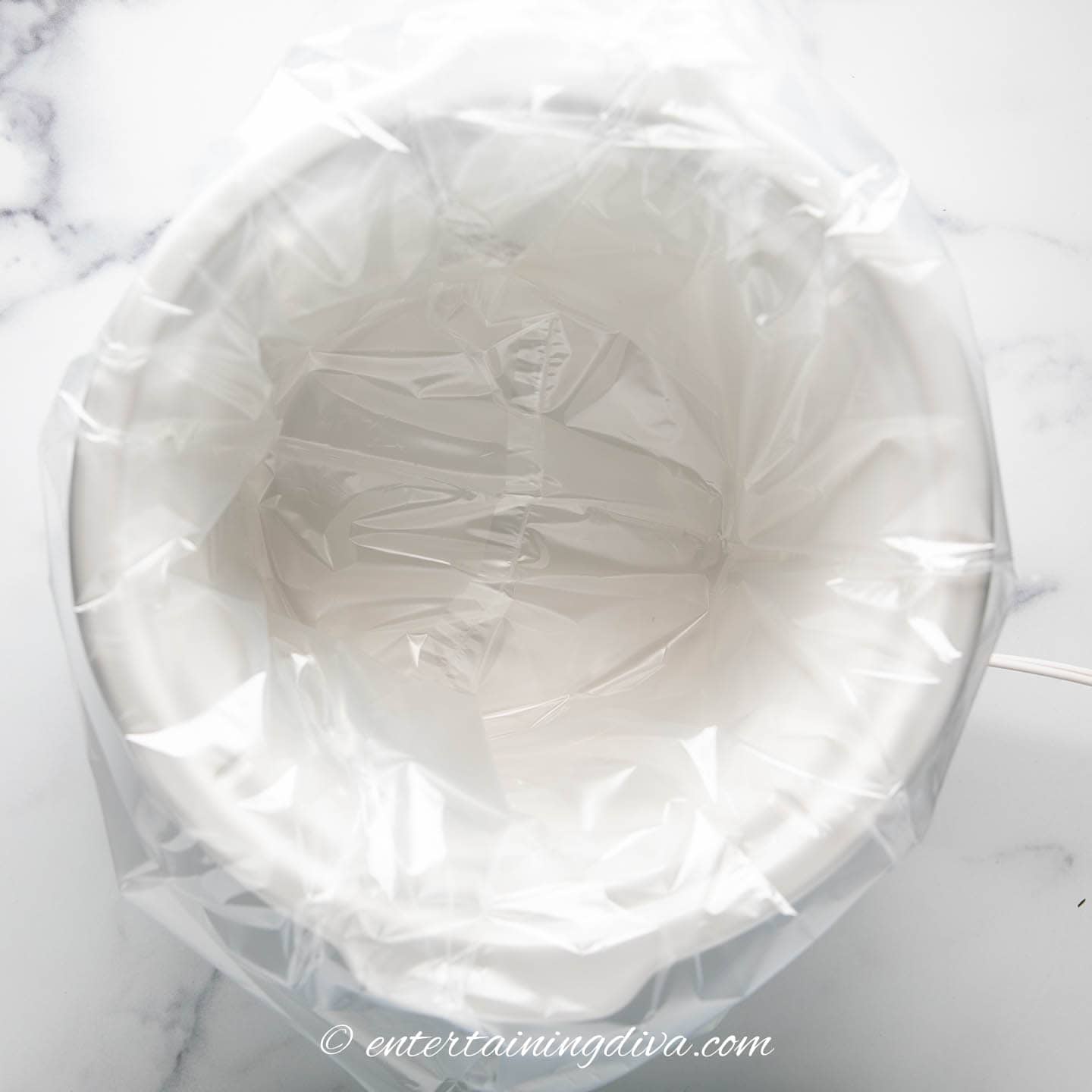 slow cooker liner in a crock pot