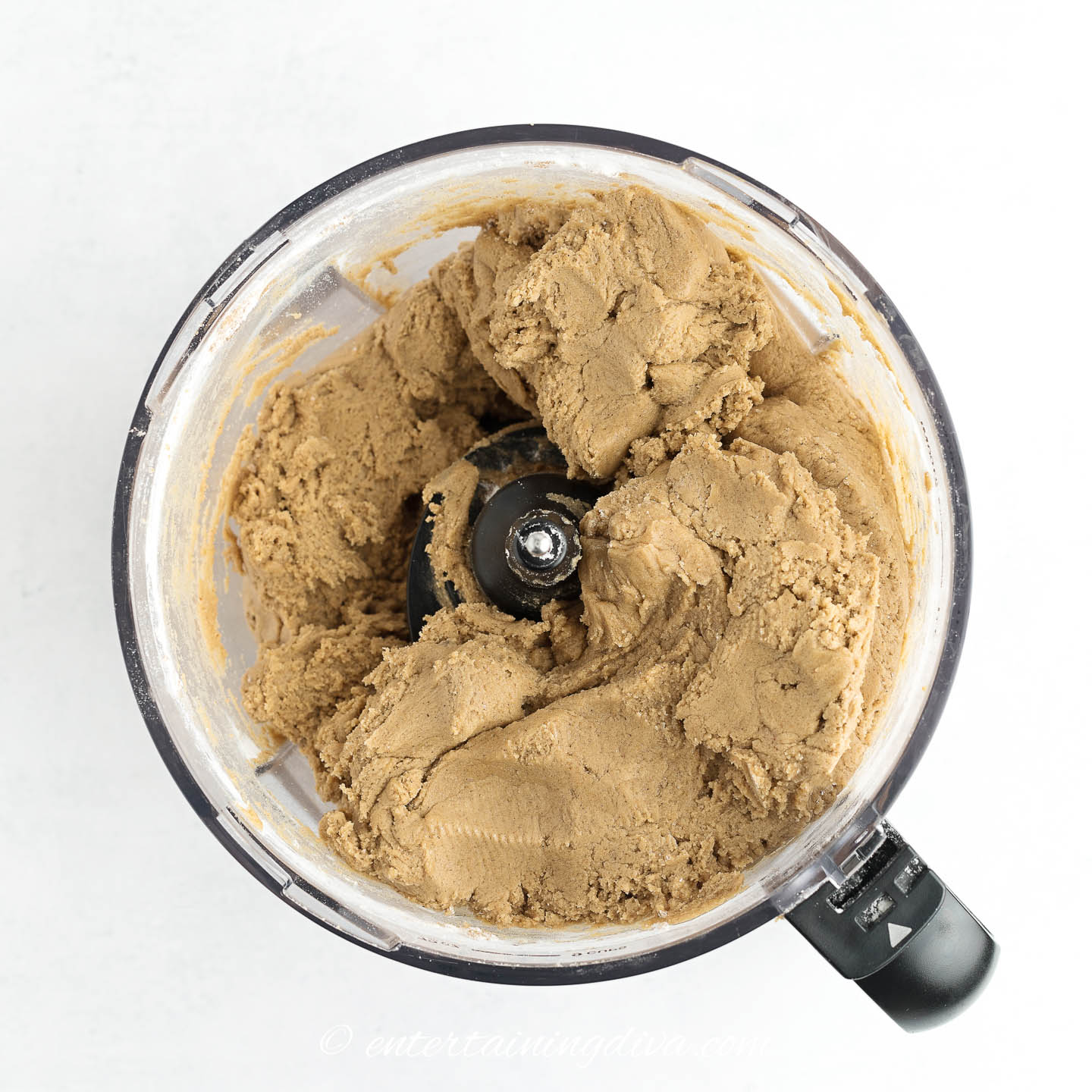 gingerbread cookie dough in a food processor