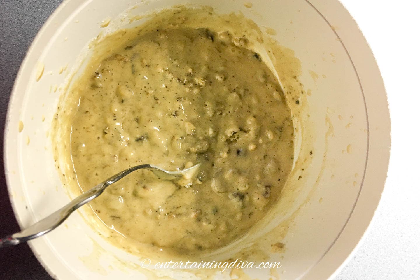 The bread batter mixed in a bowl