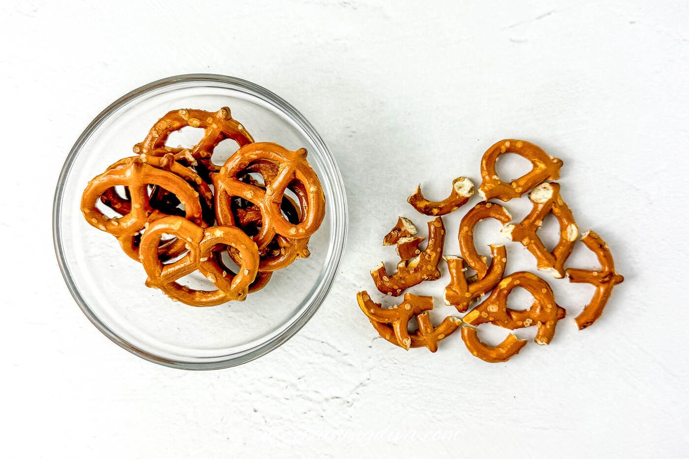 pretzels in a bowl and broken into pieces