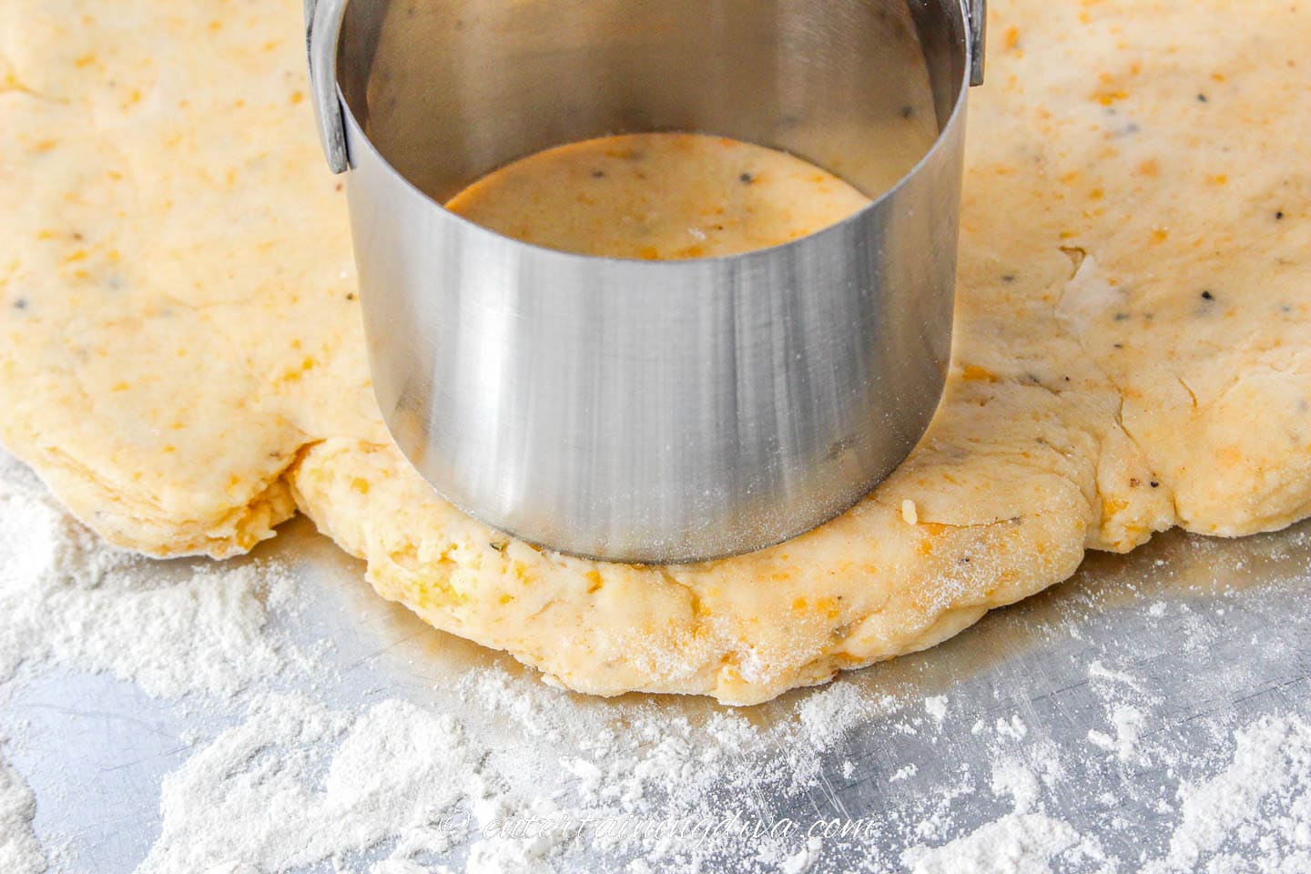biscuit cutter on biscuit dough