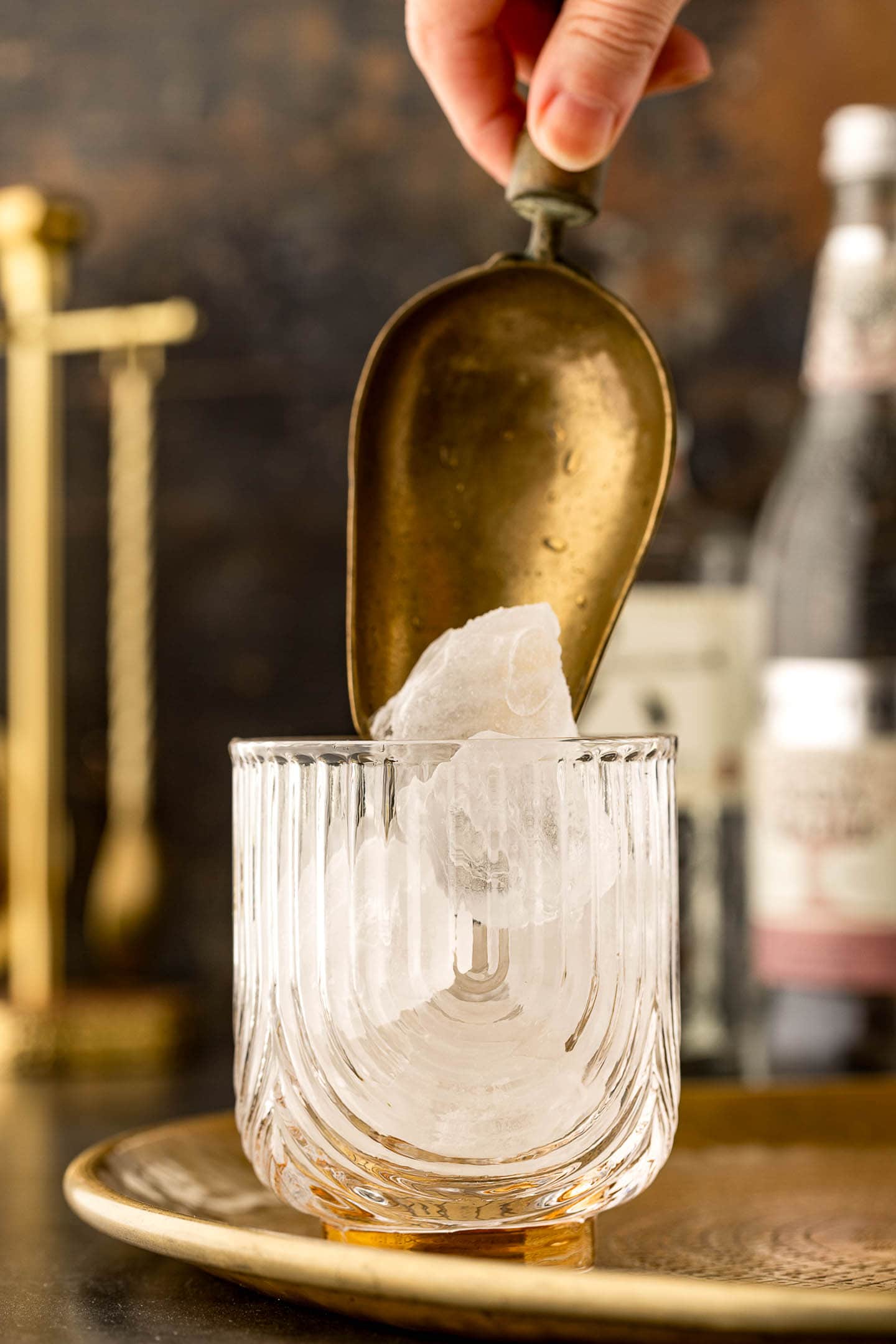 Glass being filled with ice