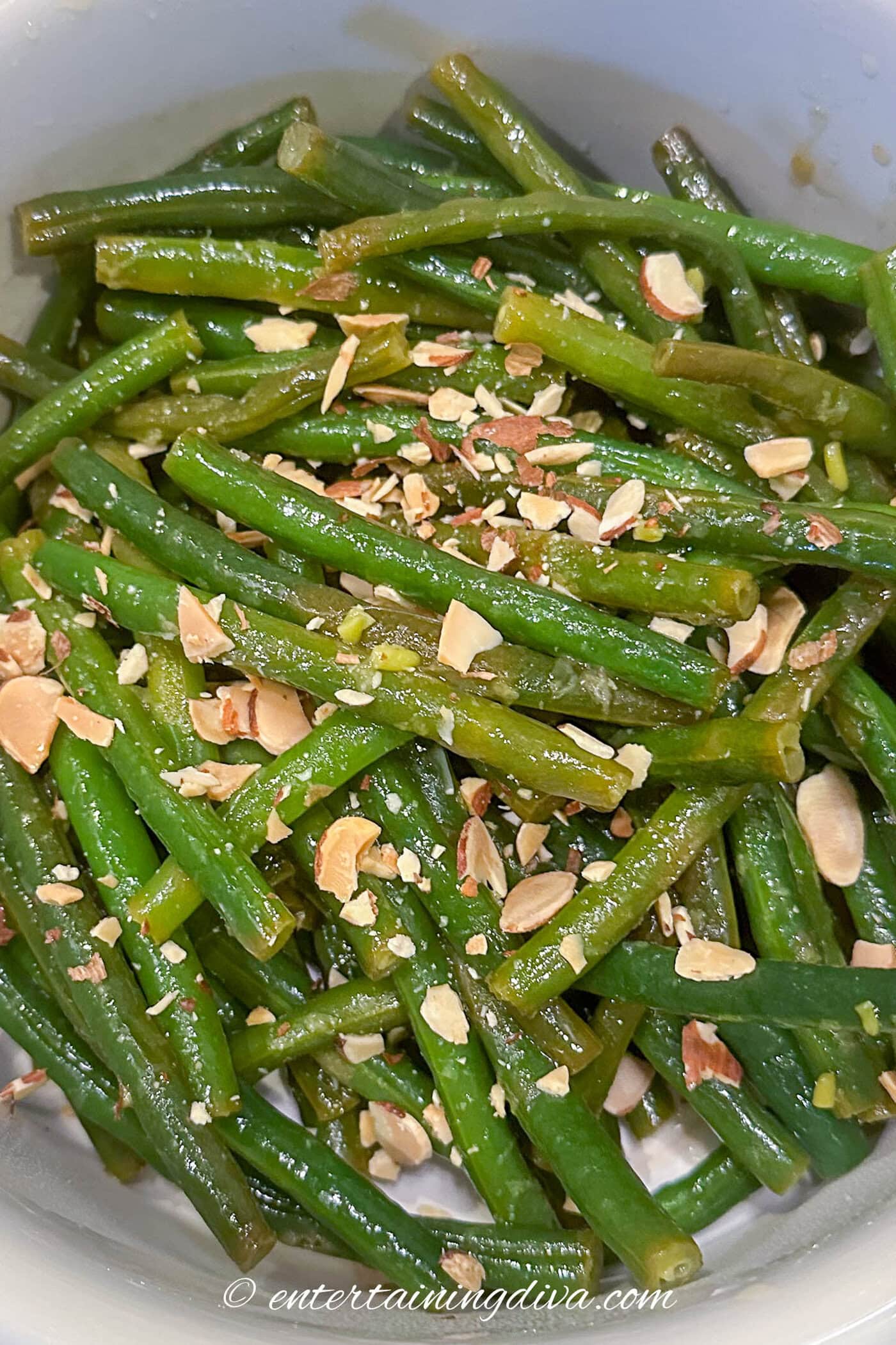 close up of green beans almondine