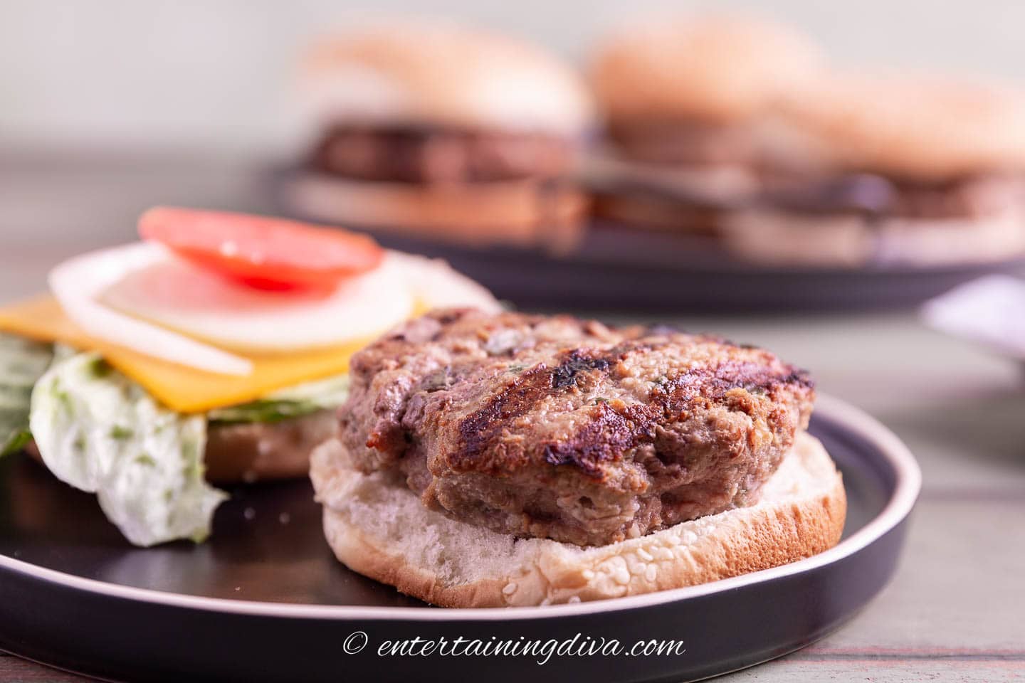 An open-faced grilled pesto turkey burger