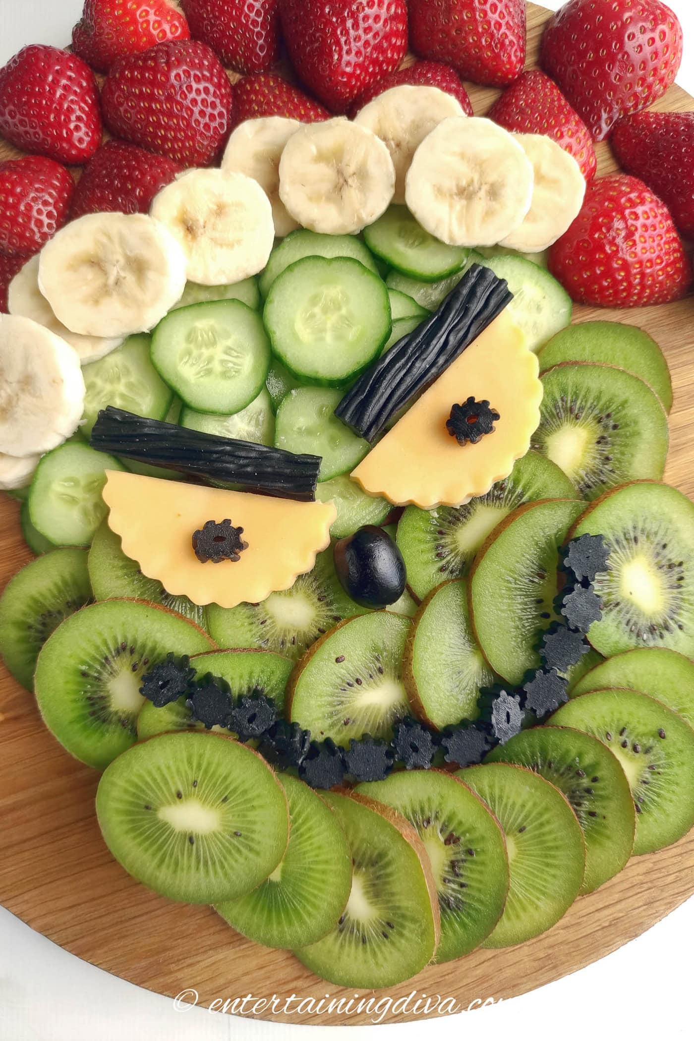 close up of the Grinch face charcuterie board