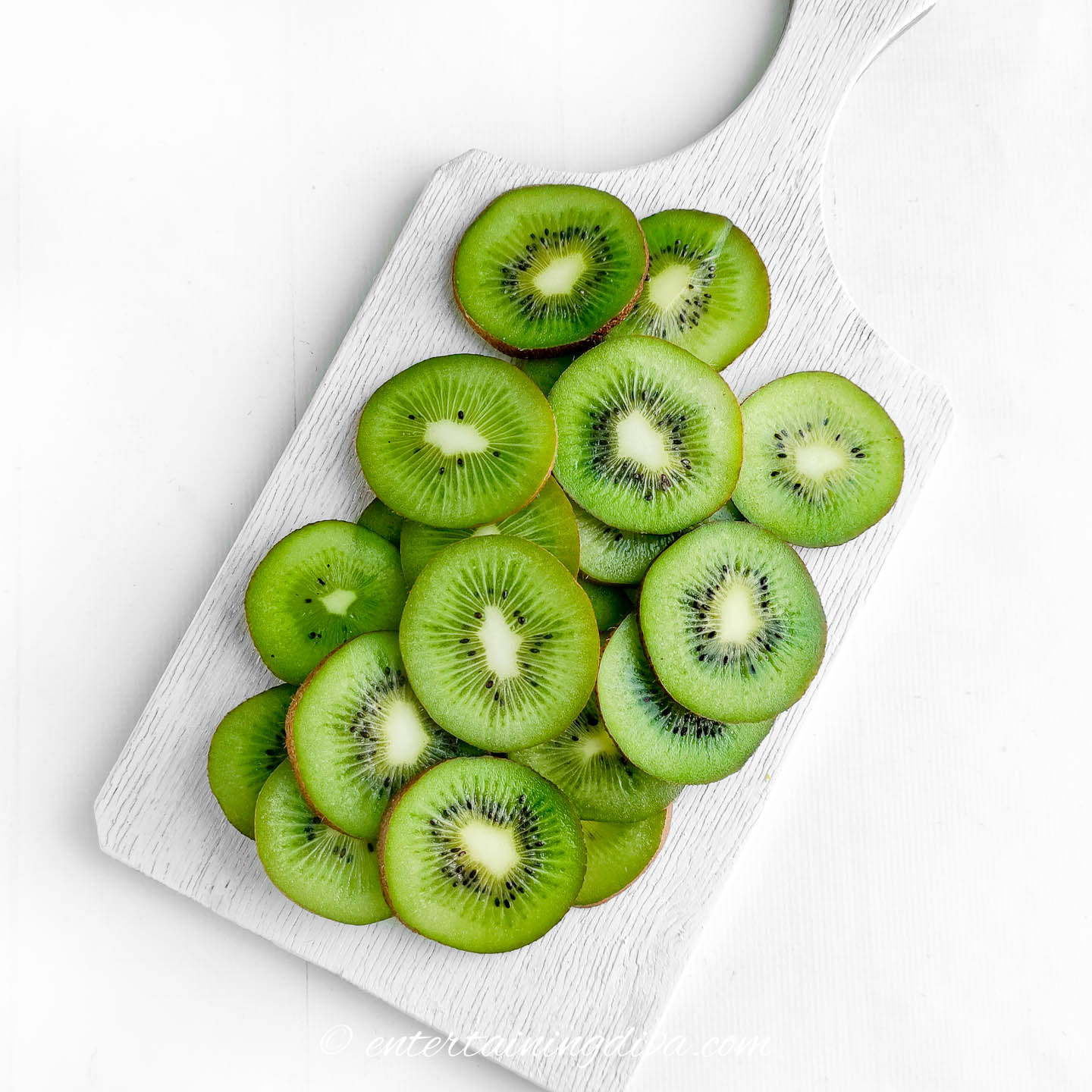 Sliced kiwi on a cutting board