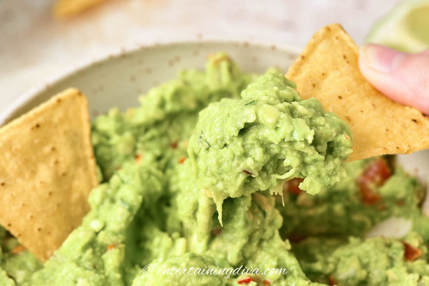 close up of guacamole on a chip
