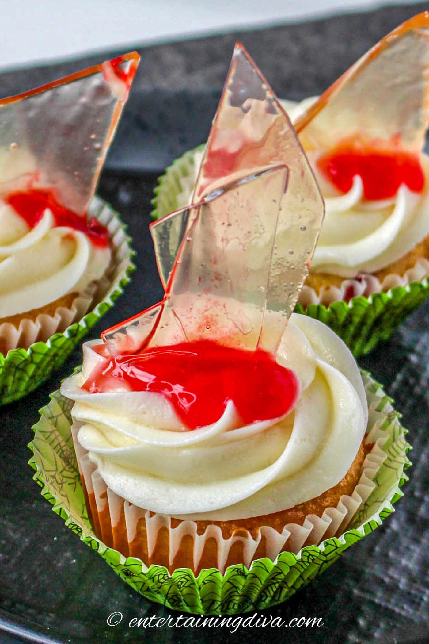 Halloween cupcakes decorated with sugar glass and fake blood